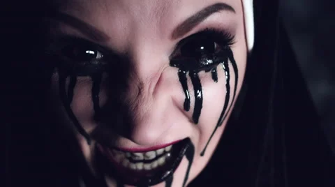 4k Halloween Shot of a Horror Woman Screaming with Blackout Eyes, close-up Stock Footage