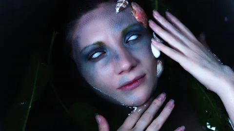 4k Halloween Shot of a Horror Woman Mermaid Posing in Water Stock Footage