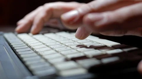 4k Hand close-up of developer who typing text code at retro old laptop Stock Footage 86730897