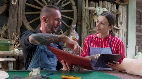4K, hand leather maker I am giving samples each animal's skin those who Stock Footage 238438827