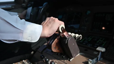 4K Hand of pilot push thrust lever handl... | Stock Video | Pond5