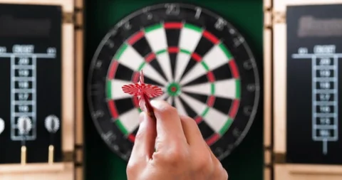 4K - Hand throws a dart into dartboard Stock Footage 118469712