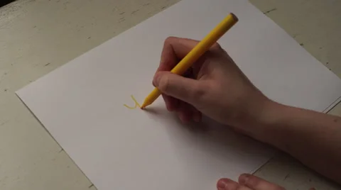 4k hand writing YIPPEE! on a white paper using a yellow felt pen, happiness Stock Footage 63129174