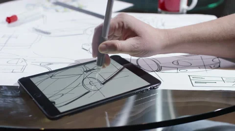 4K Hands using computer tablet with creative automotive design drawings Stock Footage