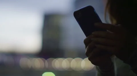 4K Hands using a phone in the city with blurred background, shot on RED EPIC Stock Footage 53130942