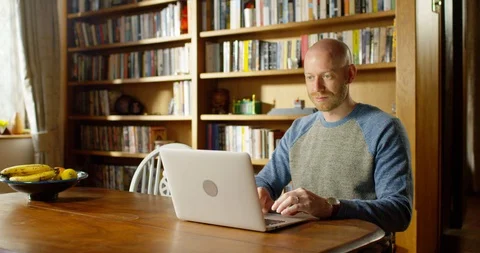 4K handsome young businessman working at home. Stock Footage 128354428
