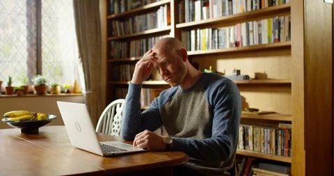 4K handsome young businessman working at home. Stock Footage 128354980