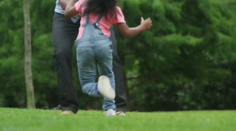 4K Happy African American father & daughter having fun in the park Stock Footage