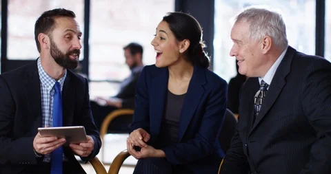 4K Happy business group with computer tablet chatting and laughing Stock Footage 104632569