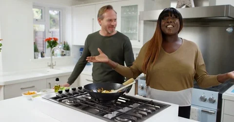 4K Happy extrovert TV presenters preparing a healthy meal for TV cookery show 스톡 동영상 75246705