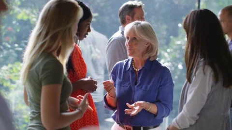 4K Happy female friends or business colleagues chatting together at social event Stock Footage