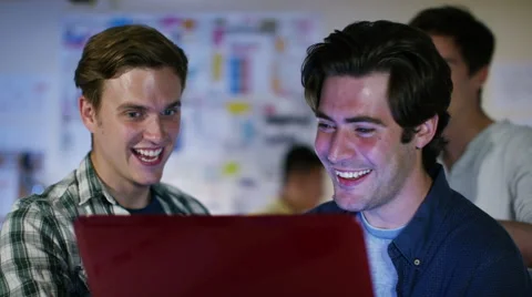 4K Happy male computer programmers working together give a high five 스톡 동영상 54476898