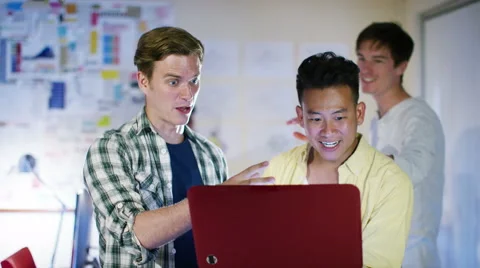4K Happy male computer programmers working together give a high five 스톡 동영상 54480360