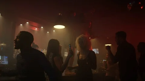 4K Happy Party Crowd Drinking &amp; Dancing In Nightclub Video stock 75649829