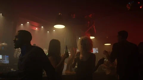 4K Happy Party Crowd Drinking &amp; Dancing In Nightclub Stock Footage 75650077