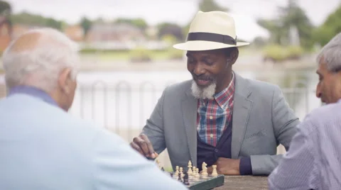 friends playing chess, Stock image