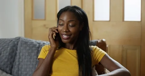 4K Happy smiling woman at home making a friendly phone call. Stock Footage