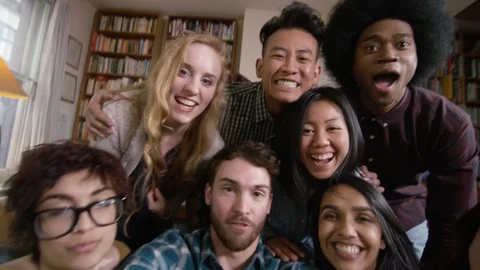 4K Happy student friends in shared accommodation pose for selfie Stock Footage 70074584