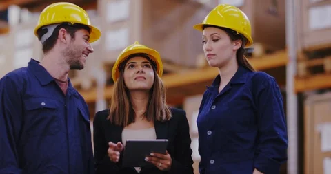 4K Happy team of workers in warehouse looking at tablet &amp; checking inventory Stock Footage 102142503
