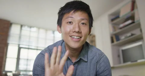 4K Happy young man having a video chat, seen from computer screen's pov Stock Footage 66366485