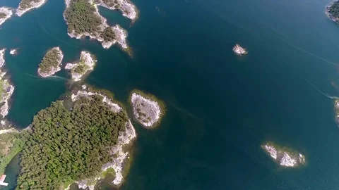4K HD Aerial view of forest islands and sea at archipelago. Camera moves forward Stock Footage 78610484