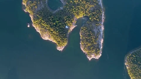 4K HD Aerial view of forest islands and sea at archipelago moments before sunset Stock Footage 78646223