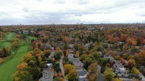 4K- HD Drone Flight Over Beautiful Fall Trees Through Golf Club Video stock 142026060