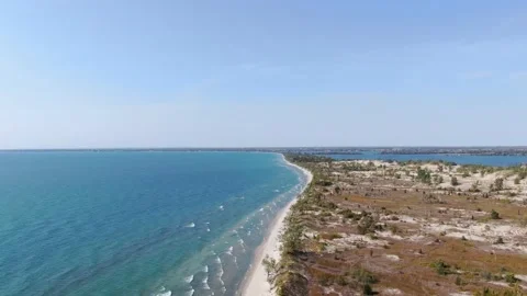 4K- HD Drone Flight Over Lakeshore Through Horizon in Sandbanks Stock-Footage 142026500
