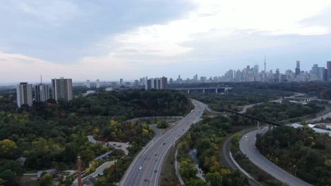 4K- HD Drone Flight Over Don Valley Parkway Towards Toronto Downtown Skyline Stock-Footage 142026943