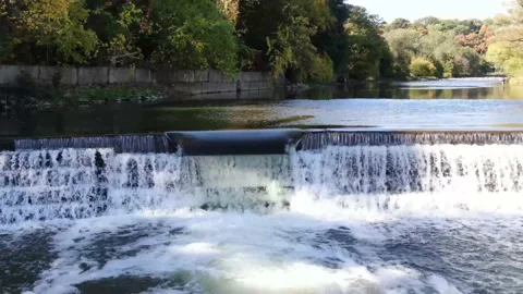 4K- HD Drone Flight Stands Near a Water Fall Humber River in Toronto, Ontario Stock-Footage 142026933