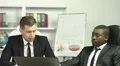 4K & HD resolutions - the businessmen discuss the project in the office interior 4k or 4k+ Resolution