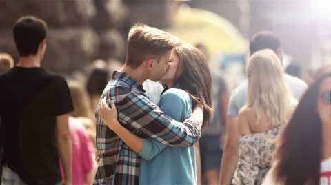 4K &amp; HD resolutions: Lovers stand in the crowd stream at the street, summer Stock Footage 40382839