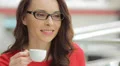 4K & HD resolutions; Young woman has coffee break at the trade center HD Footage