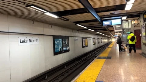 4K HD video of BART Train entering Lake Merritt Station in Oakland, CA Stock Footage 264424529