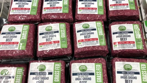 4K HD Video panning down packages of Ground Beef for sale in grocery store Stock Footage 157737223