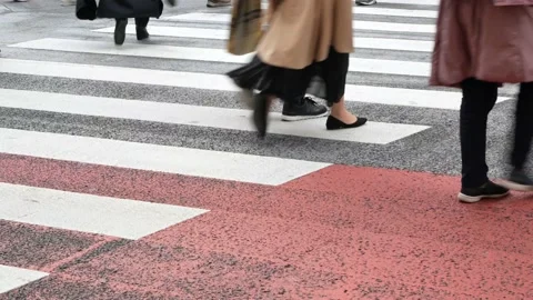 4k HD video while walking cross the street over zebra line Stock Footage 169422505
