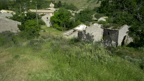 4k HDR Corfu Greece looking down to Tourist Woman walking to Ruins 10Bit Stock Footage 198422935