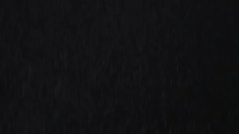 4k Heavy angled rain falling in front of the camera against black screen Stock Illustration