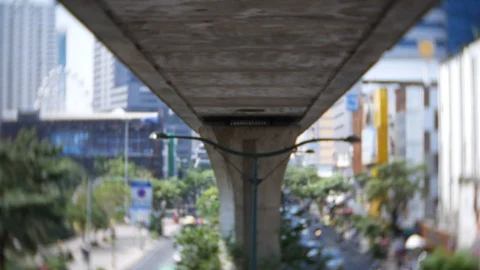 4k, heavy traffic through central business district. 4k, the skyscrapers Stock Footage 86244168