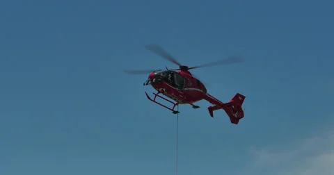 4K Helicopter Tow Line Hover, Wide Angle Shot Stock Footage 47080505
