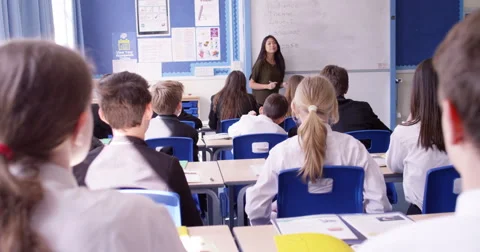 4k, Helpless teacher in a class full of naughty secondary students. Stock Footage 63033296