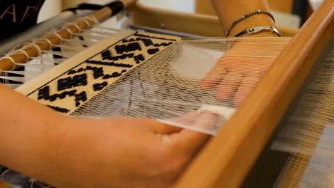 4K High Angle Static Shot of Weaving Loom and Lace Rug Setup Stock Footage 327863483