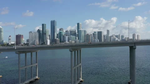 4K high bridge over the Miami harbor with cityscape on the background, Florida 스톡 동영상 134574659
