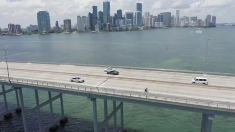 4K high bridge over the Miami harbor with cityscape on the background, Florida 스톡 동영상 134575268