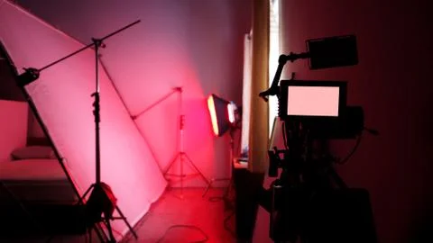 4K high definition video camera monitor on tripod Stock Photos