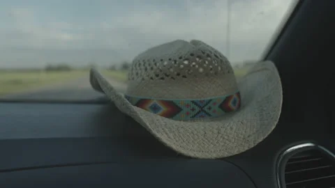4K High Quality Cowboy hat on car dashboard  (Prores 444 LOG color) Stock Footage 137822704