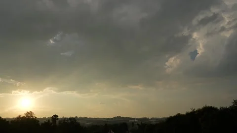 A 4K High Res timelapse of a storm rolling into a suburban area, with dark cloud Stock Footage 259099645