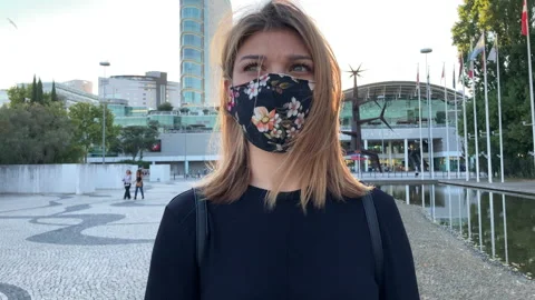 4K high resolution slow motion footage of a beautiful blonde woman wearing a  Stock Footage 138880234