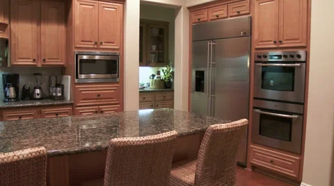 4K Home Interior Modern Clean Upscale Large Kitchen with Island Stock Footage 36749298