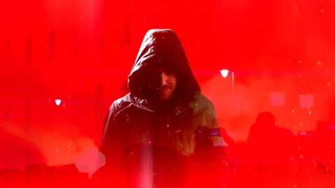 4K Hooded Devil Man, Dark Demon Face, Red Fire Smoking Background Stock Footage 74625652